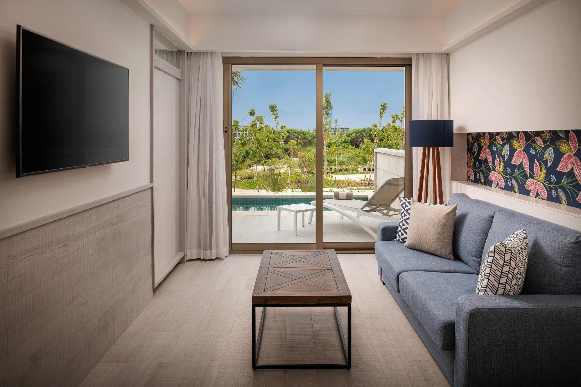 Catalonia Grand Costa Mujeres All Suites & Spa Cancun Ngoại thất bức ảnh Living room of a suite at the Hilton Tulum Resort